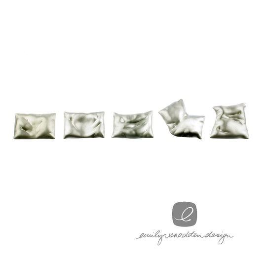 Pillow brooches